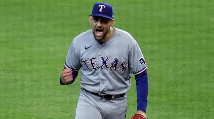 Rangers pitcher Nathan Eovaldi pumps his first after escaping a bases loaded, no outs jam in Game 2 of the ALCS
